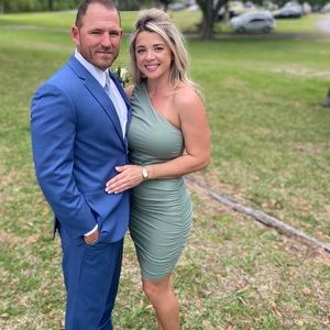 Flattering one shoulder neutral green dress